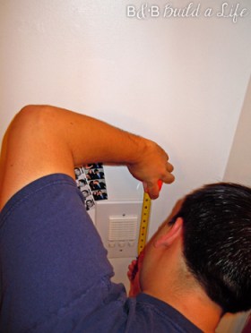 fitting the cork into the frame @ BandBBuildALife.com