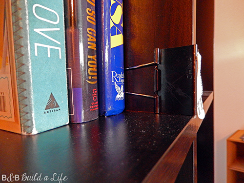 hang artwork picture frame on bookcase book shelf @ BandBBuildALife.com