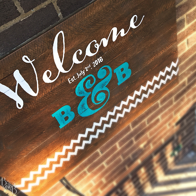 DIY Rustic Wood Plank Hand Painted Wedding Sign turned into Welcome Sign
